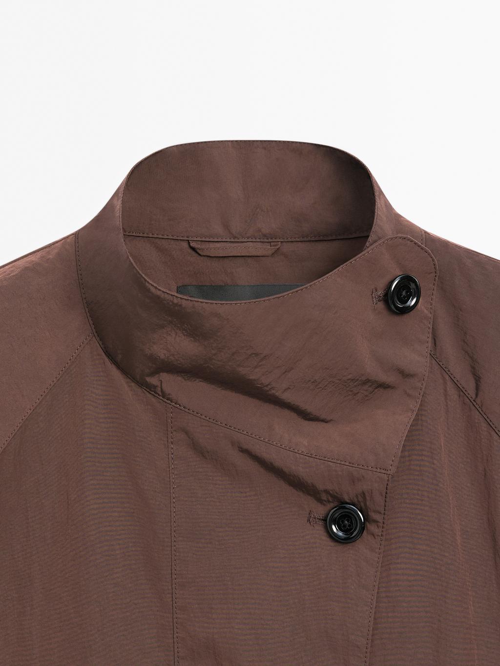 Oversize flowing trench coat in water-repellent fabric