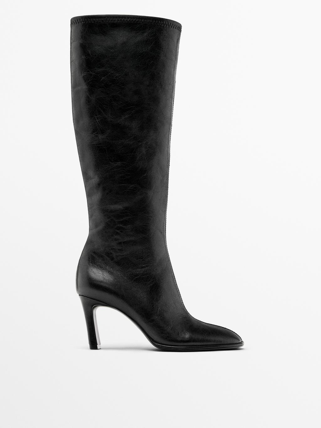 High-heel boots with elastic gores on the leg