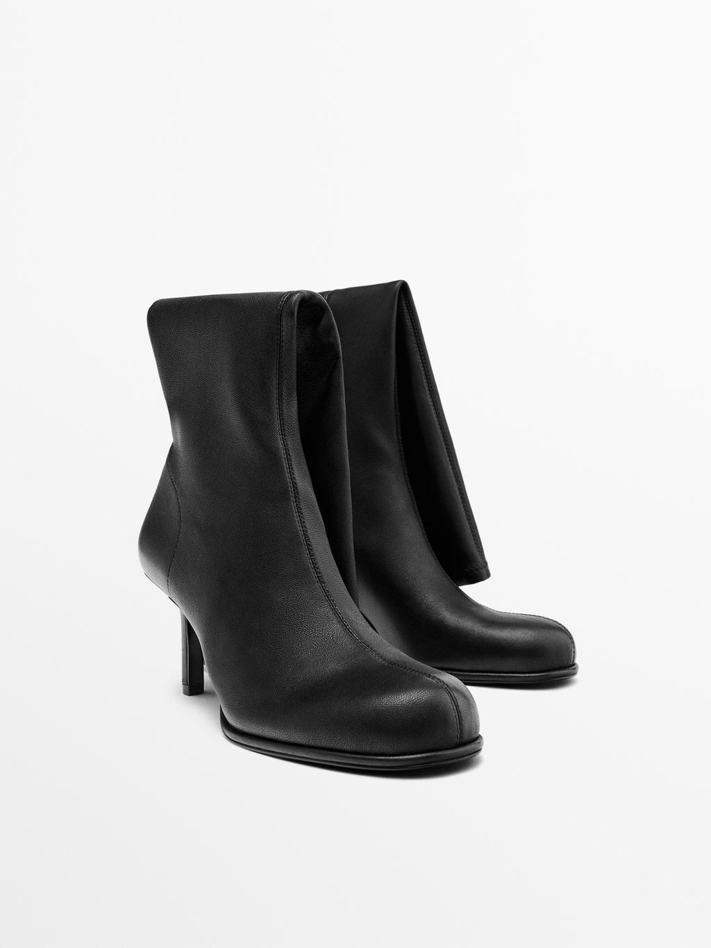 High-heel boots with rounded vamp