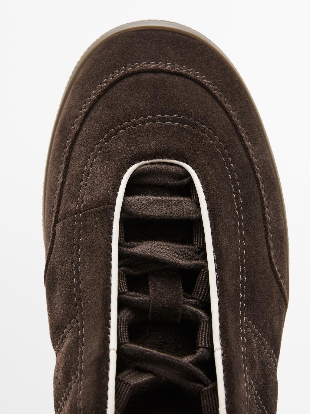 Split suede trainers with topstitching