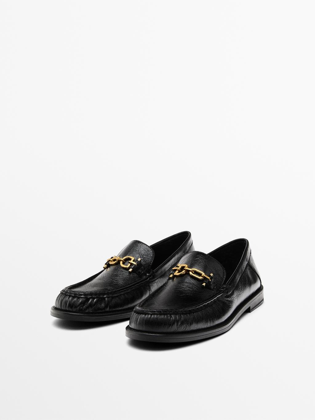 Crackled leather loafers with decorative detail